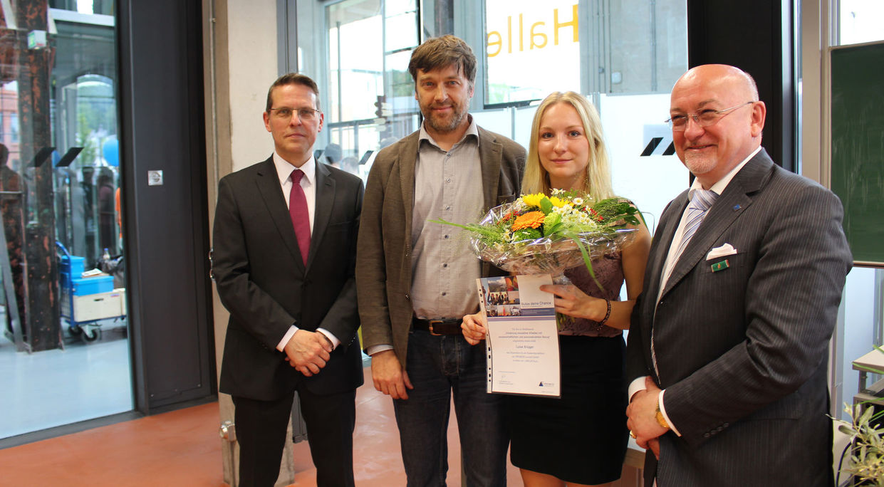 Prof. László Ungvári, President of Wildau Technical University; Luise Krüger, scholarship holder; Jens Kramer, CEO of PROMOS; Prof. Bertil Haack, Wildau Technical University (from the right) PROMOS Stipendiumvergabe an der TH Wildau 2016